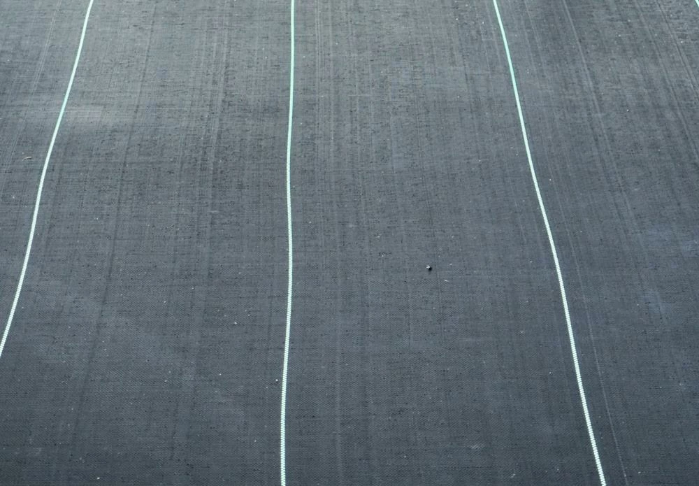 RSI Landscape Fabric & Stakes Premium Landscape Fabric (Common: 3-ft x 50-ft; Actual: x 50-ft) 4 RSI Landscape Fabric & Stakes Premium Landscape Fabric (Common: 3-ft x 50-ft; Actual: x 50-ft) - Image 4